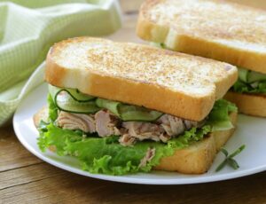 Half a tuna and salad sandwich